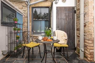 The sweet patio area is perfect for coffee and cake.