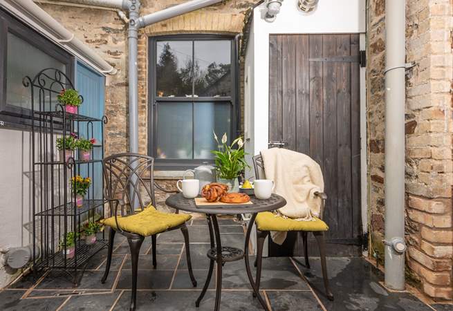 The sweet patio area is perfect for coffee and cake.