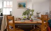 Gather around the dining-table. - Thumbnail Image