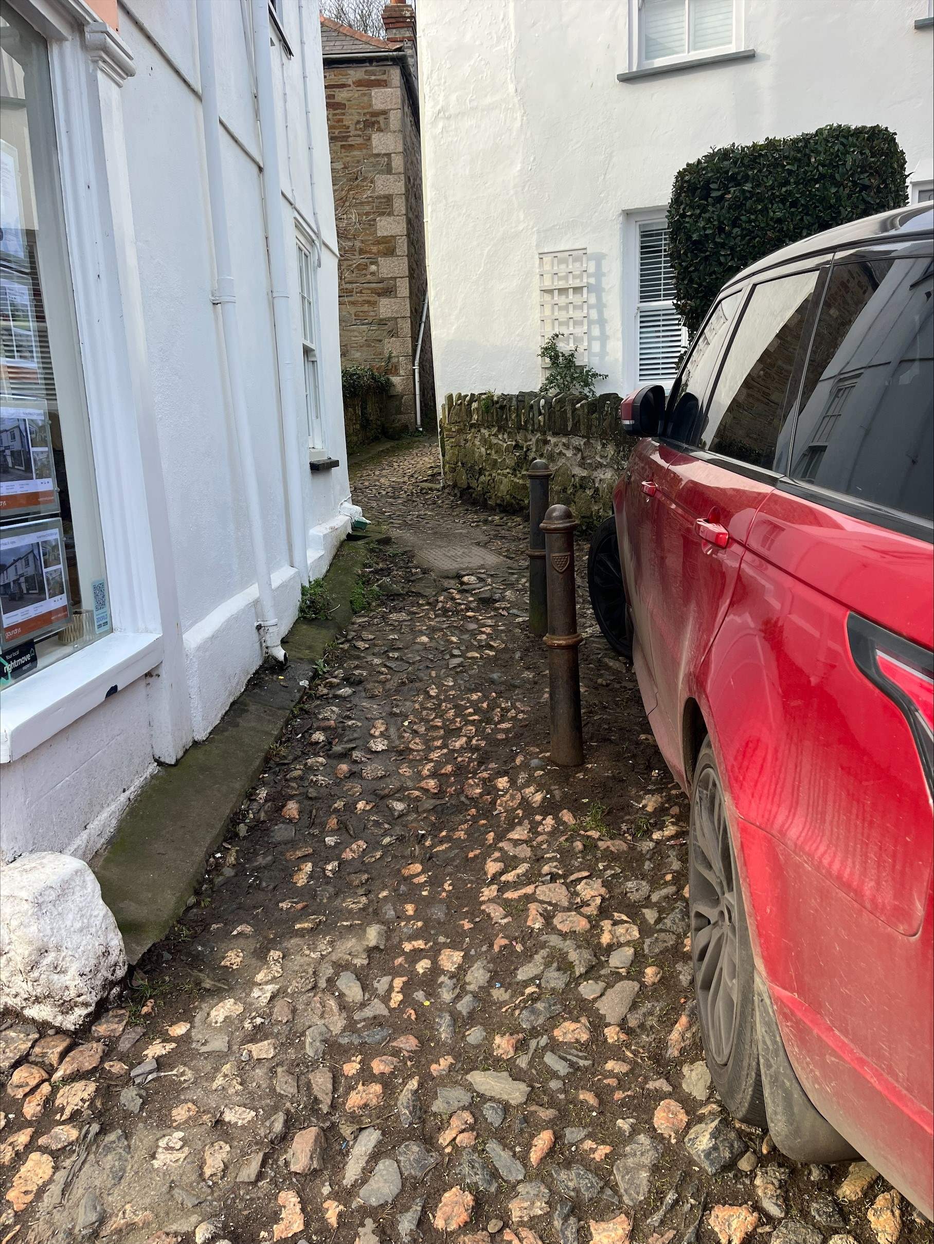 There is a cobbled path that leads to the entrance of No 7 Churchtown. 