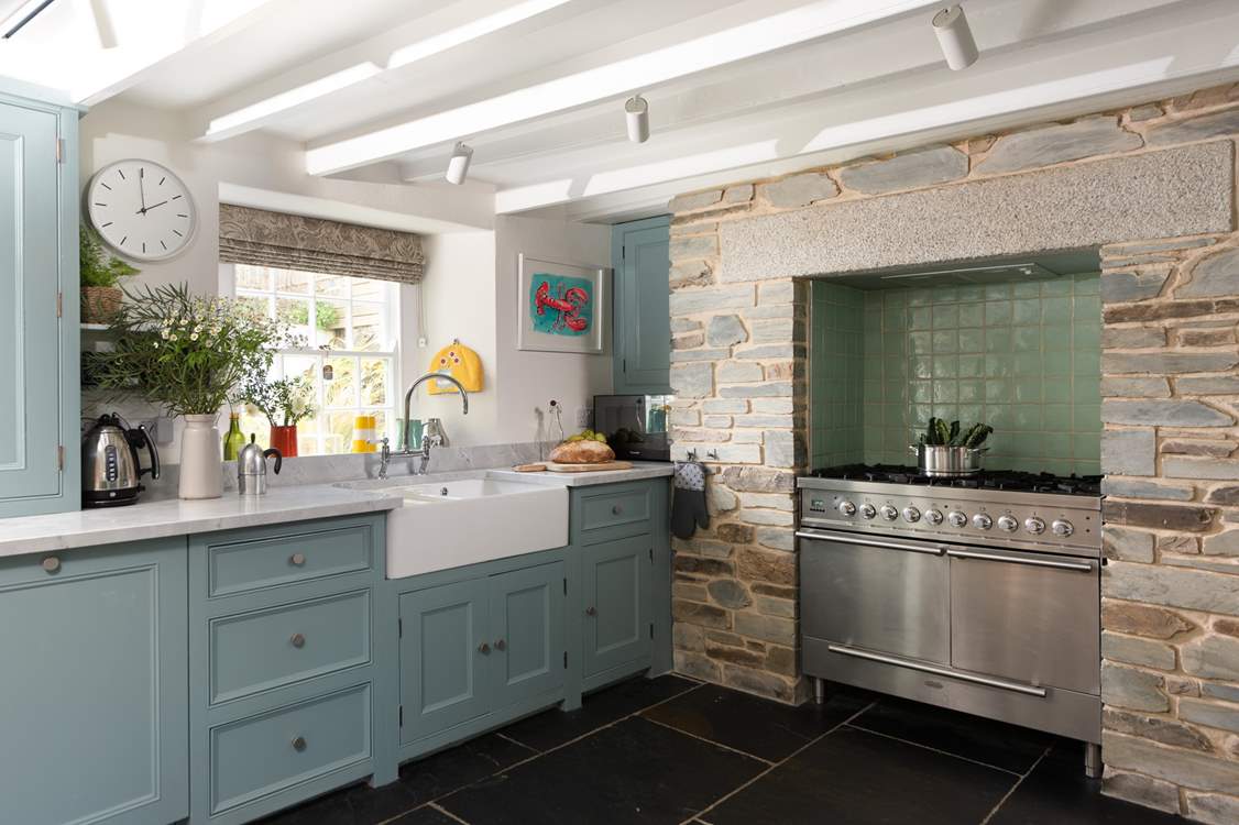 The gorgeous shaker style kitchen has a range cooker.