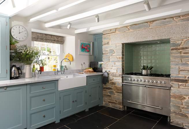 The gorgeous shaker style kitchen has a range cooker.