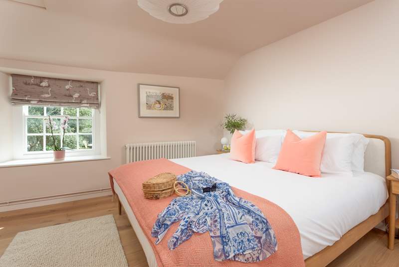 Gorgeous bedroom one has a fabulous super-king double bed and cloakroom with wc and wash-basin.