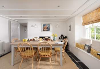 Beautifully furnished throughout, this is the farmhouse table in the kitchen/diner.