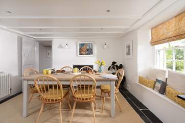 Beautifully furnished throughout, this is the farmhouse table in the kitchen/diner.