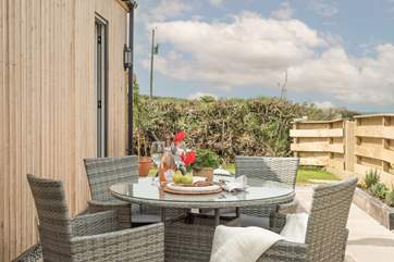 Listen to birdsong on the pretty patio.