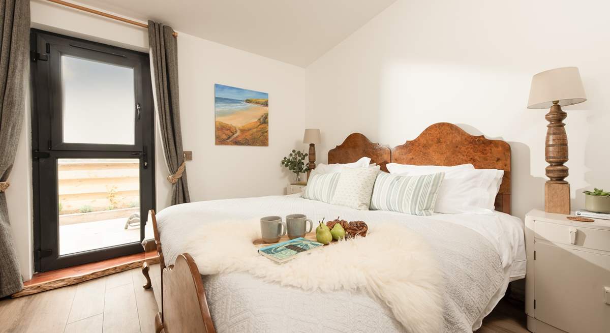 The gorgeous bedroom has a fabulous super-king bed for a restful nights sleep.