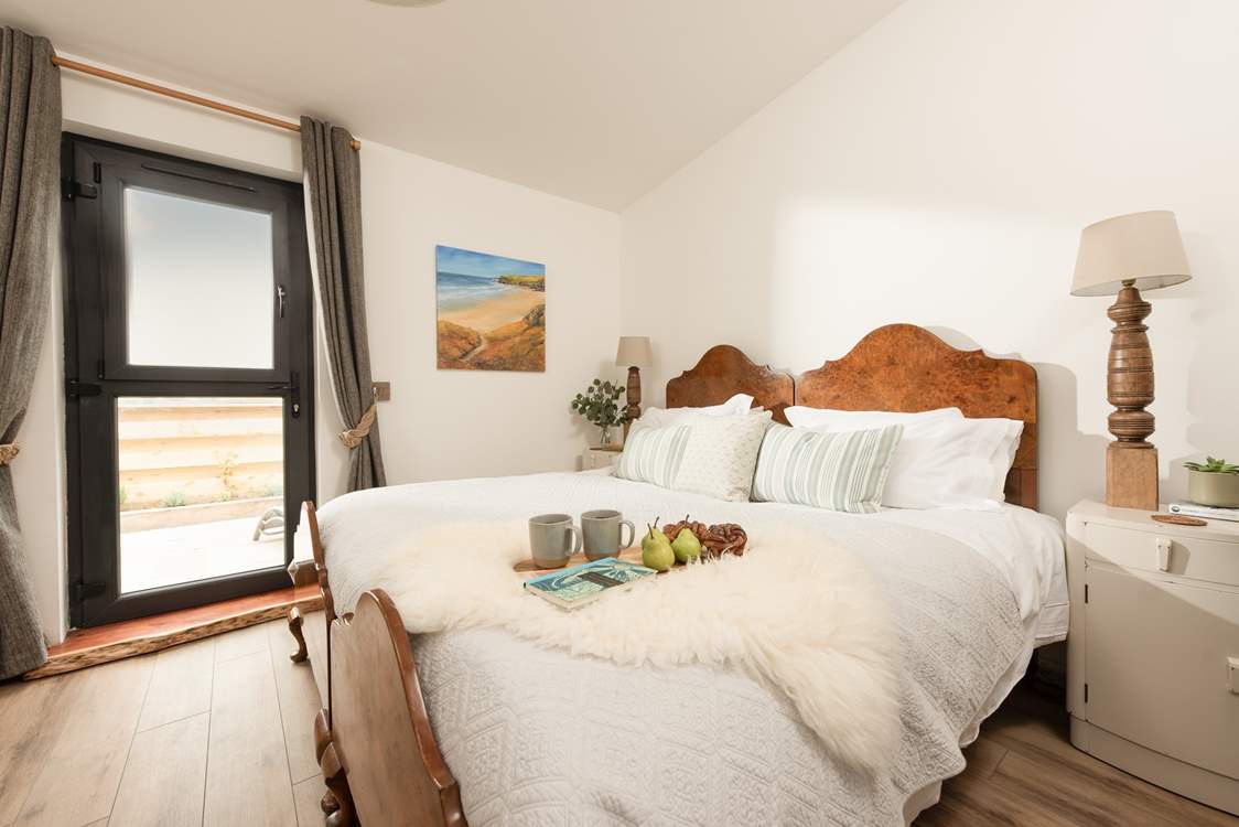 The gorgeous bedroom has a fabulous super-king bed for a restful nights sleep.