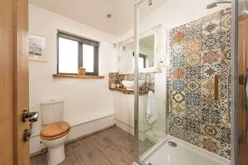 Enjoy a refreshing shower after a busy beach day.