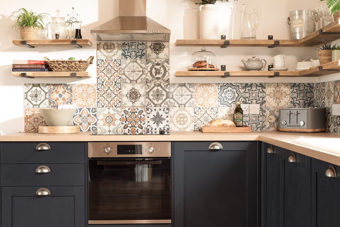 The kitchen area is oh so cute.