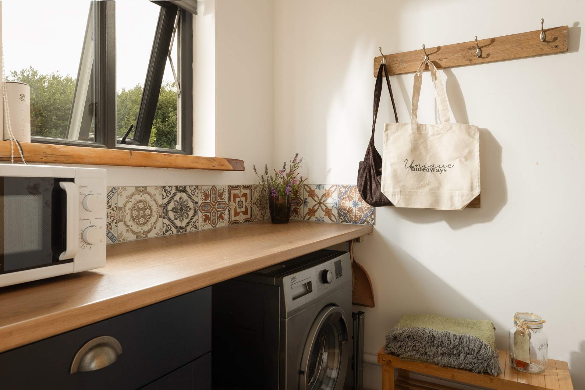 There's even a utility room with a washing machine, microwave and plenty of space to store your bags and boots. 