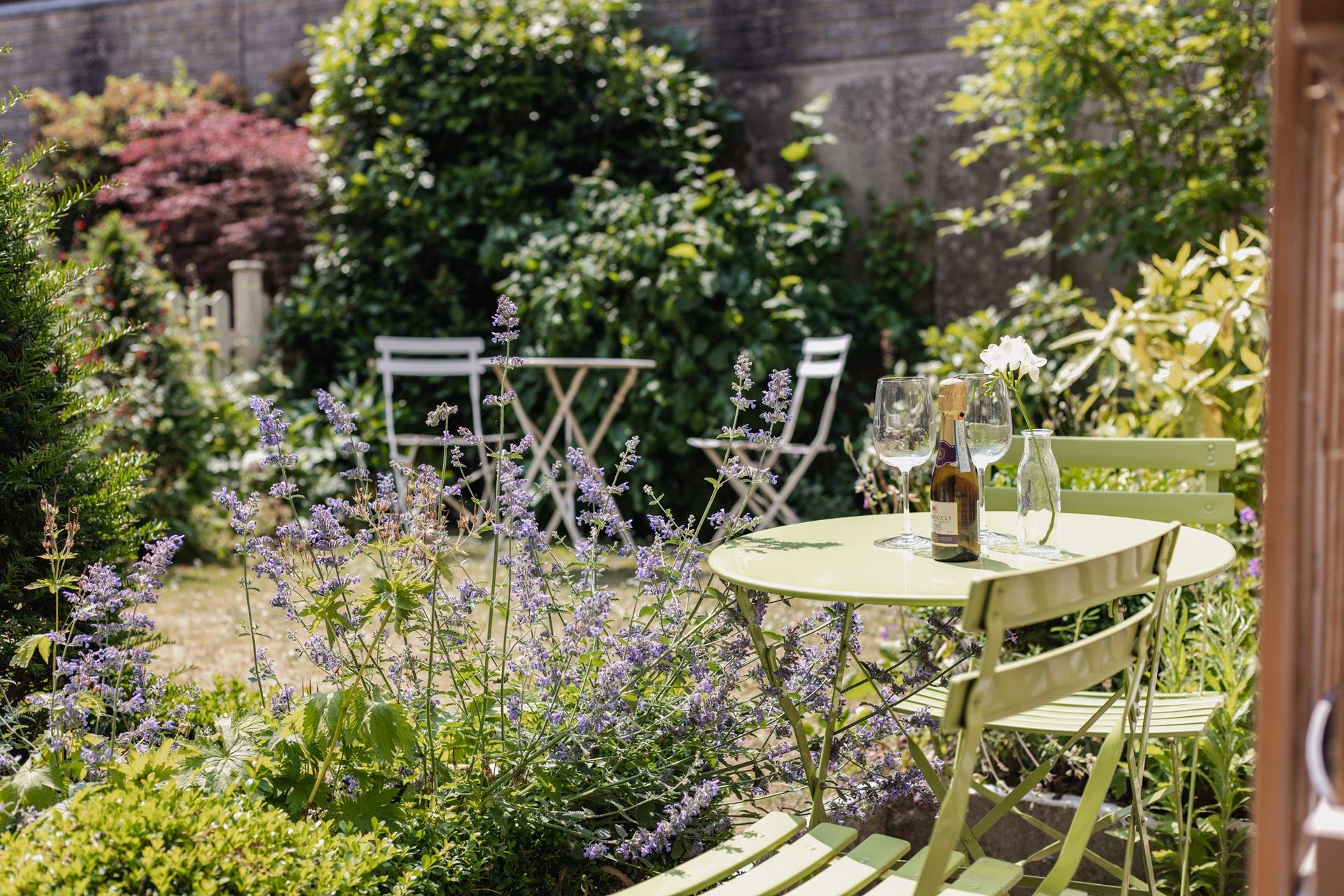 There is a shared, dainty spot outside for some al fresco dining.