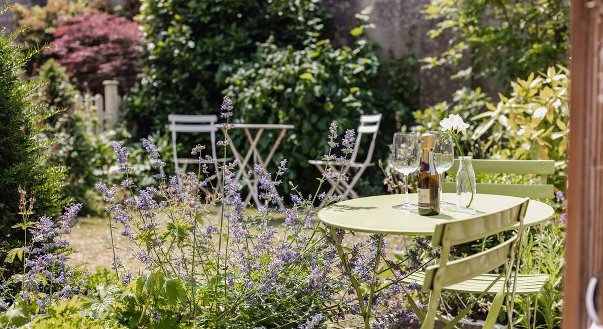 There is a shared, dainty spot outside for some al fresco dining.