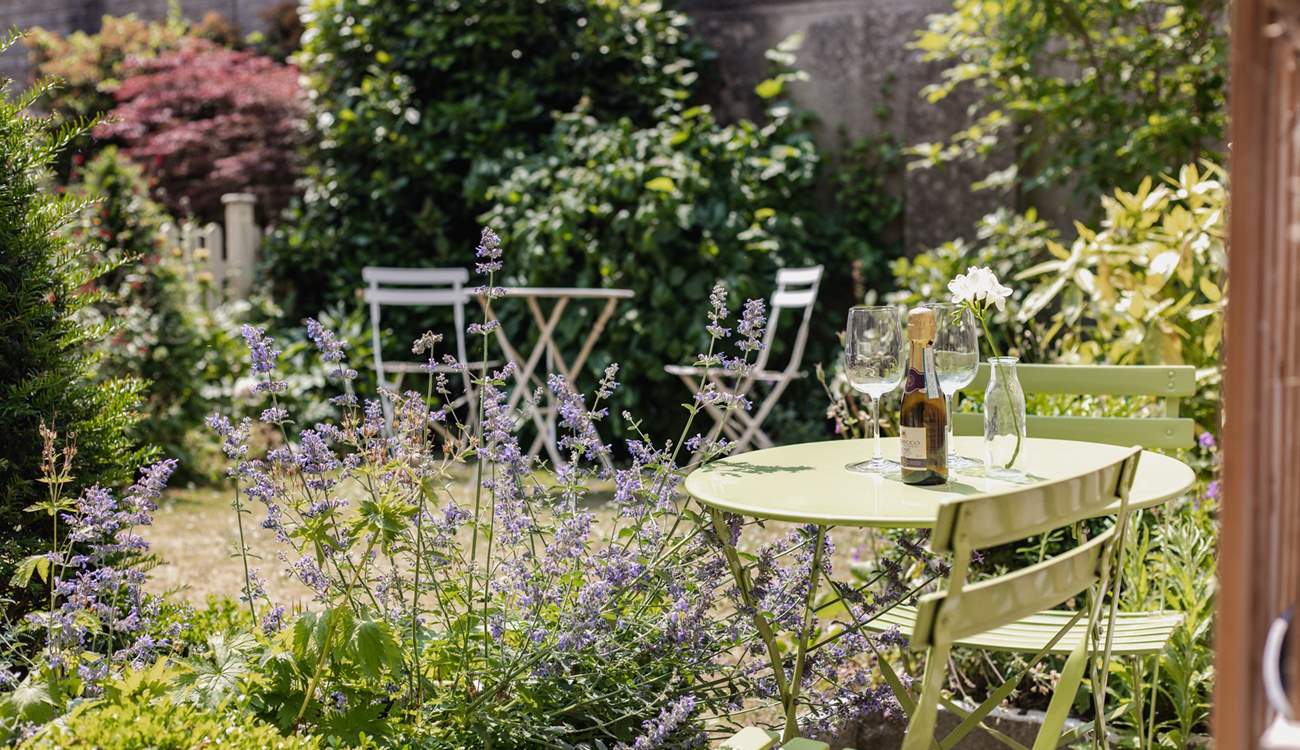 There is a shared, dainty spot outside for some al fresco dining.