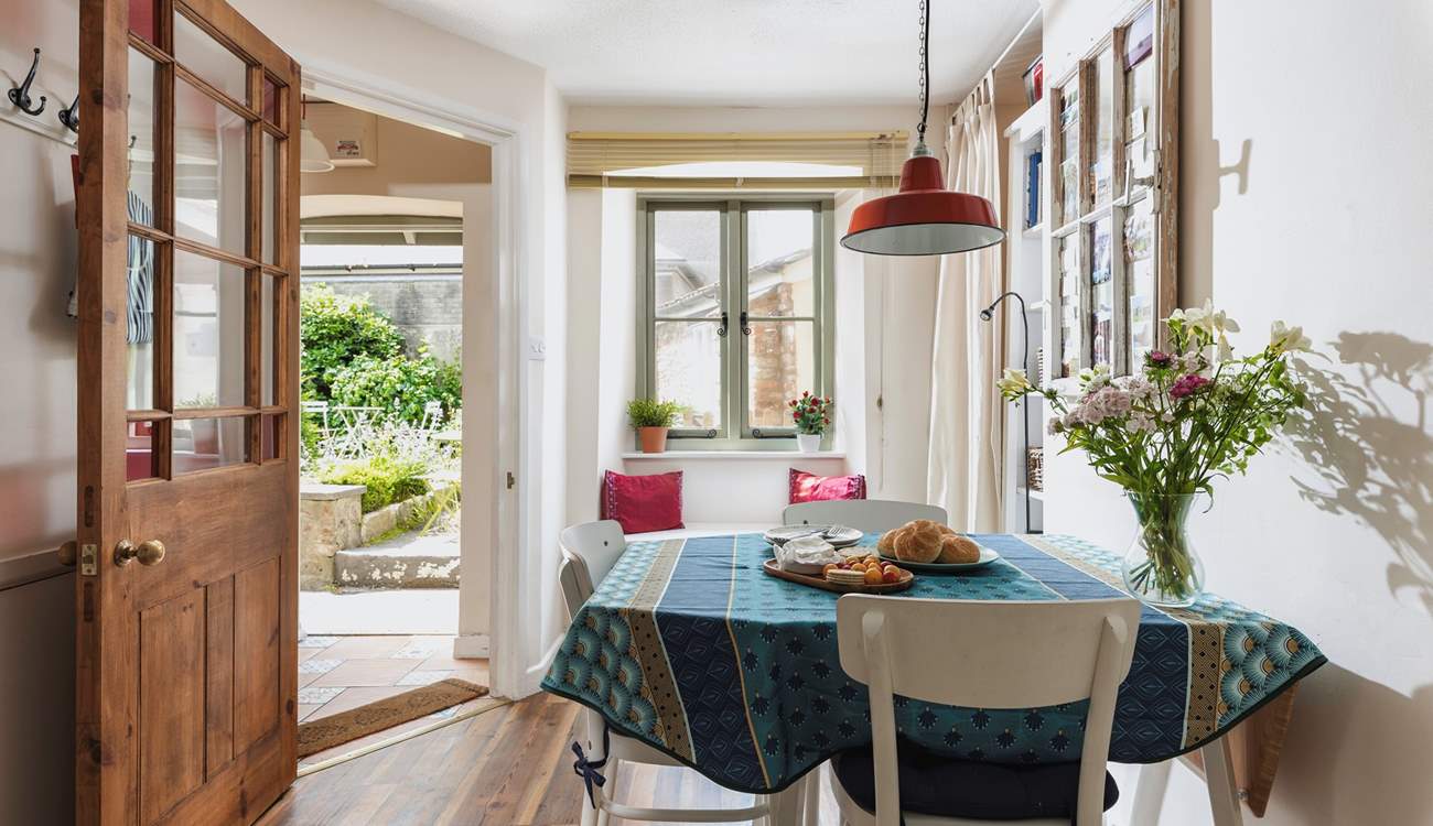 The kitchen and dining area is on the ground floor with the small seating area just outside the door.