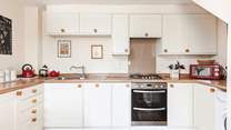 You will find all you need in this cottage kitchen.