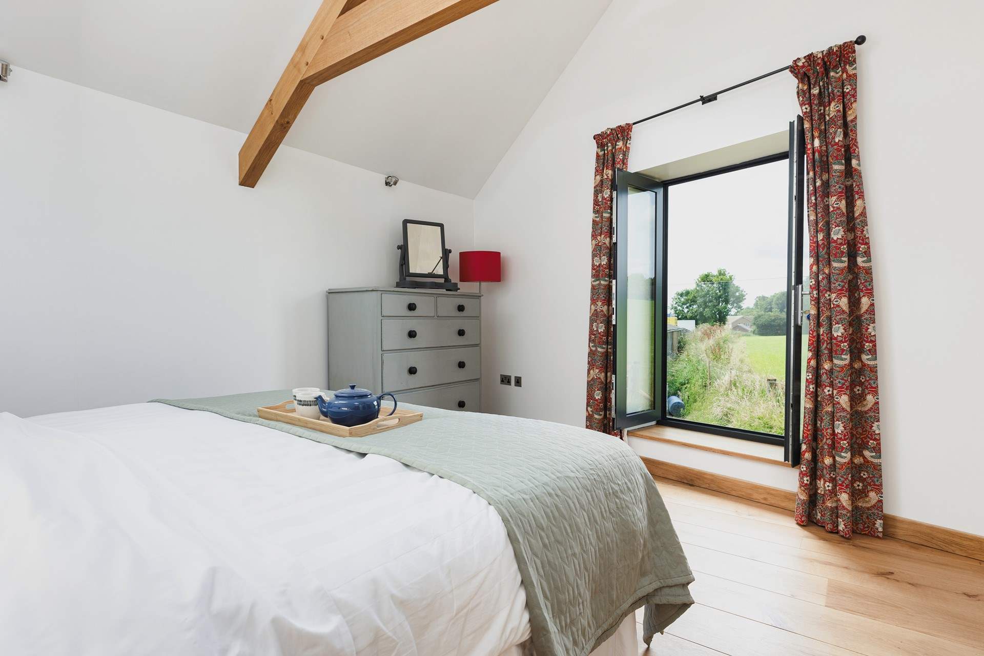 Views across the surrounding countryside can be enjoyed from the super-king bed.