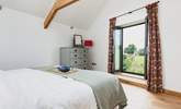 Views across the surrounding countryside can be found in the super-king bedroom. - Thumbnail Image