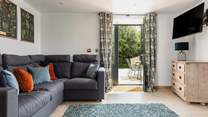 The comfy sitting-room leads onto the terrace.