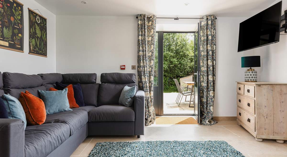 The comfy sitting-room leads onto the terrace.