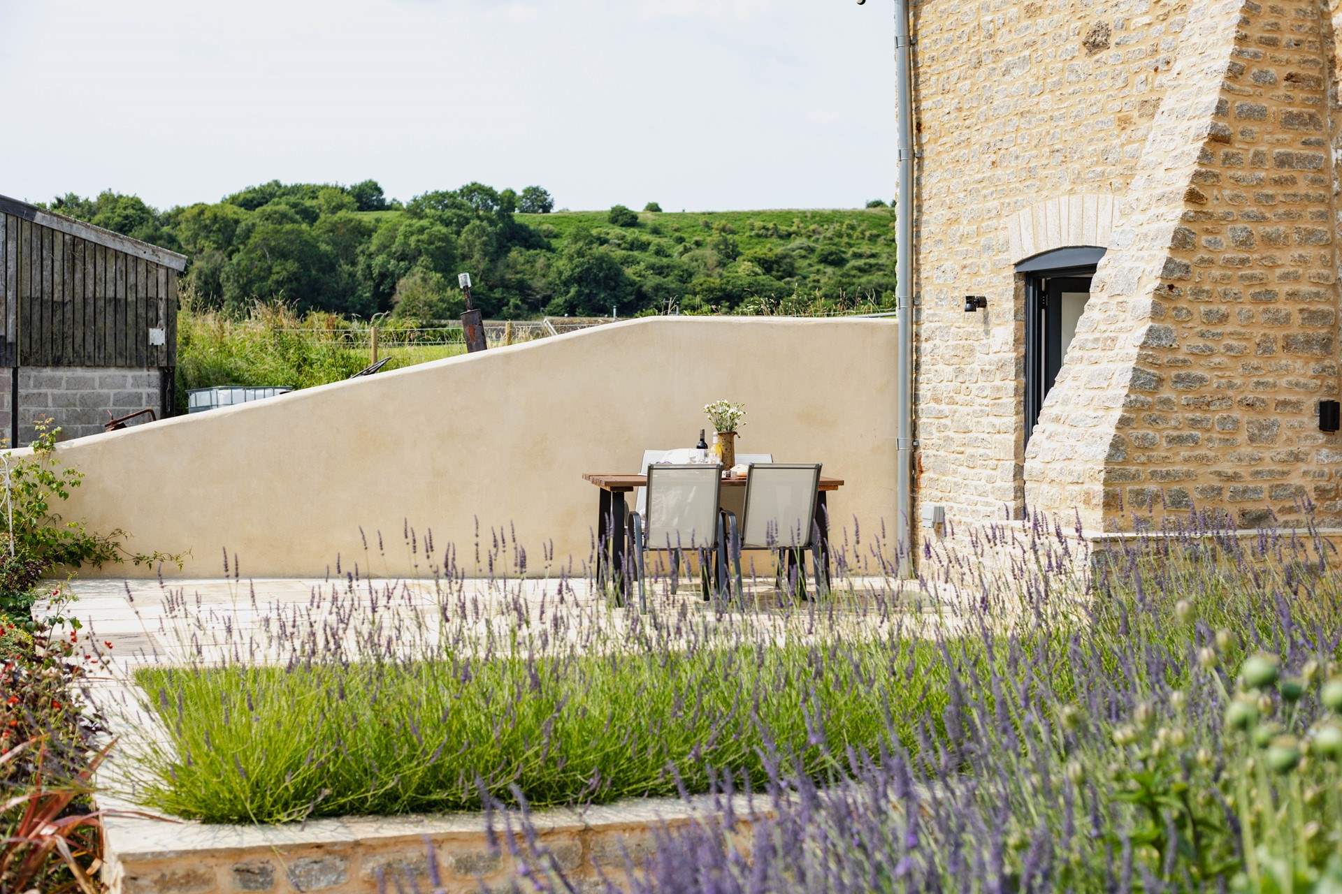 The neighbouring storage and workshop facility for a local solar energy installation company can be seen from Seymour Barn. 