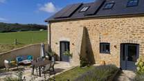 The Barn has a lovely patio space for al fresco dining and a lovely garden.