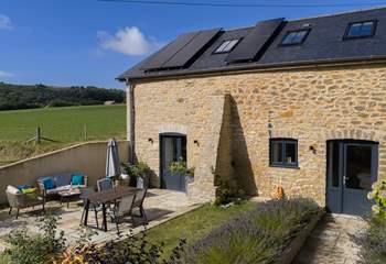The Barn has a lovely patio space for al fresco dining and a lovely garden.