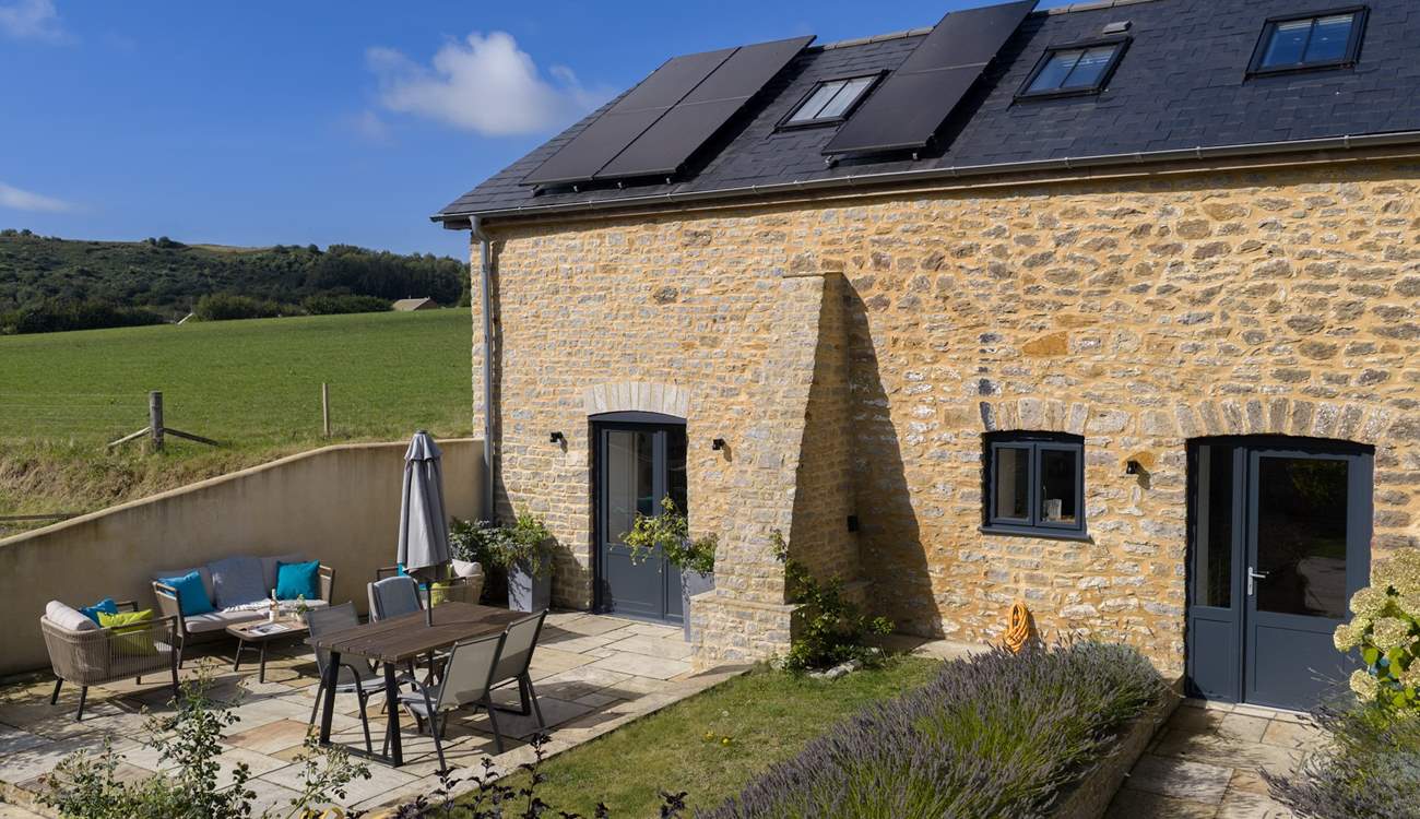 The Barn has a lovely patio space for al fresco dining and a lovely garden.