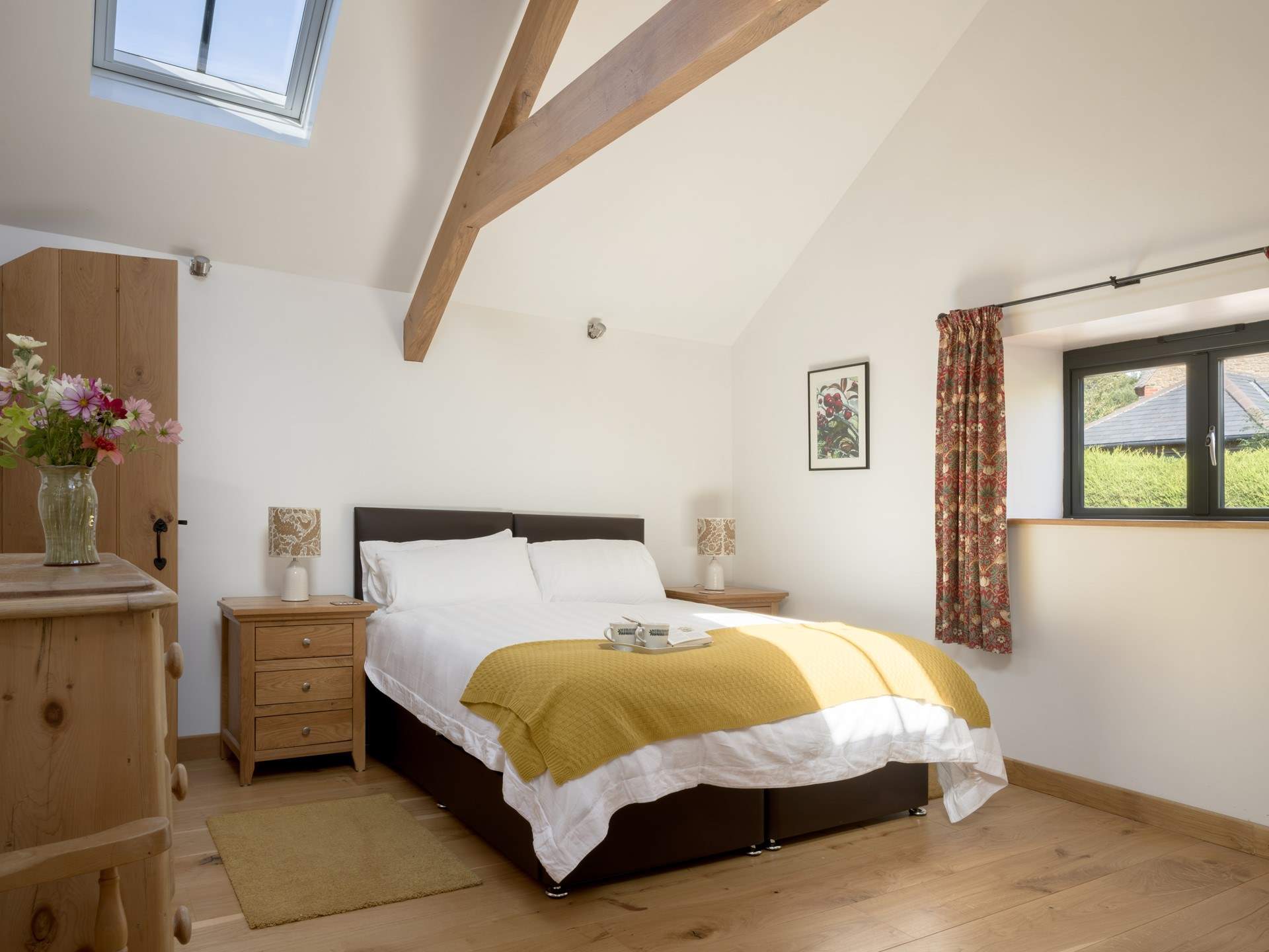 The spacious second is beautifully styled with a sumptuous king-size bed that can also be configured as two singles.