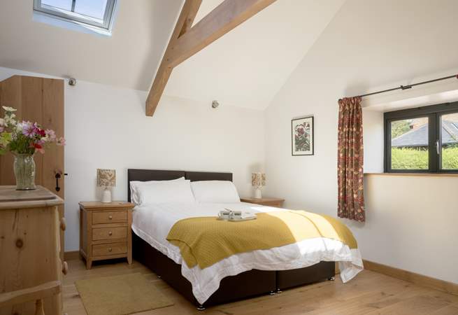 The spacious second is beautifully styled with a sumptuous king-size bed that can also be configured as two singles.