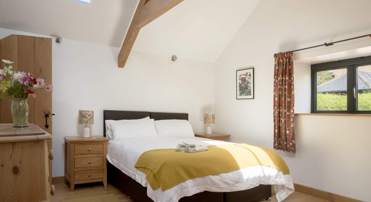 The spacious second is beautifully styled with a sumptuous king-size bed that can also be configured as two singles.