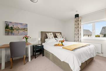The bedrooms are all stylishly furnished, this is bedroom 1.