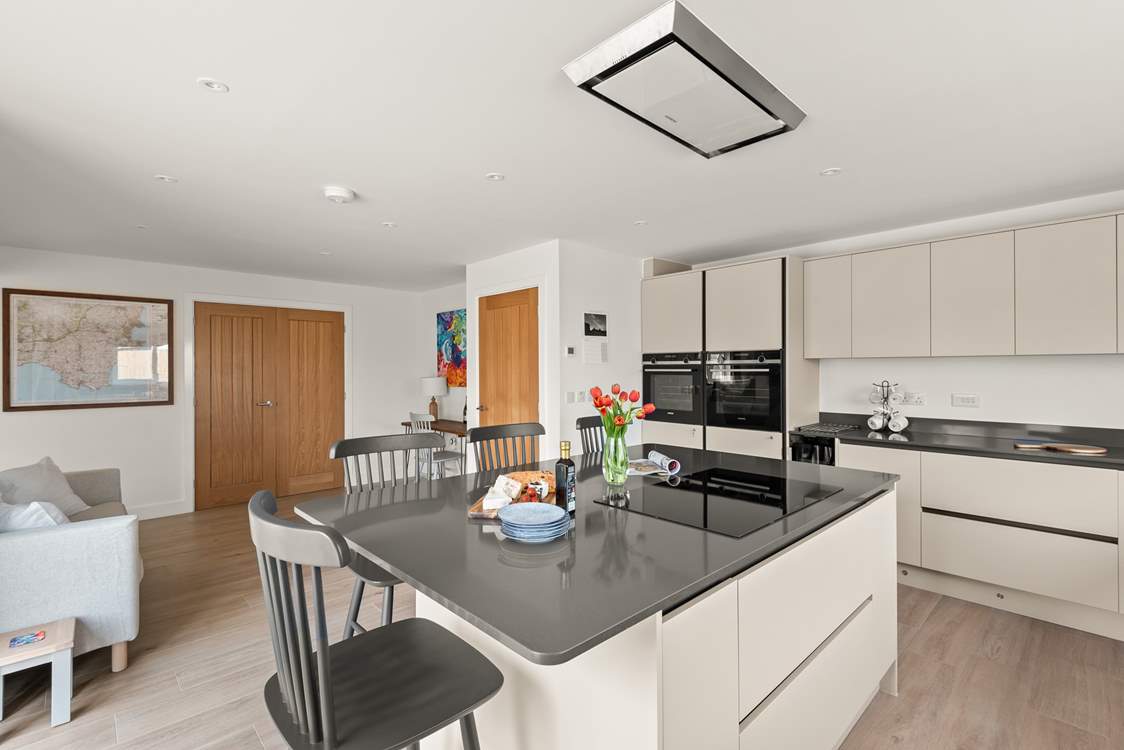 The kitchen has all the equipment you'll need including a double electric oven, and the all important dishwasher.