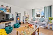 After a busy day, relax on the comfy sofas and watch a movie on the Smart TV. The wood-burner will keep you cosy throughout the seasons.
