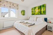 Bedroom 3 has 'zip and link' beds, giving you the choice of twin beds or a super-king double.