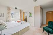 Bedroom one has a blissful super-king size bed and en suite shower-room.