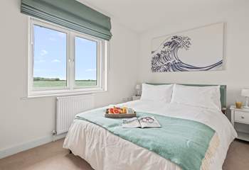 Pretty bedroom 4 is home to a comfy king-size double bed.