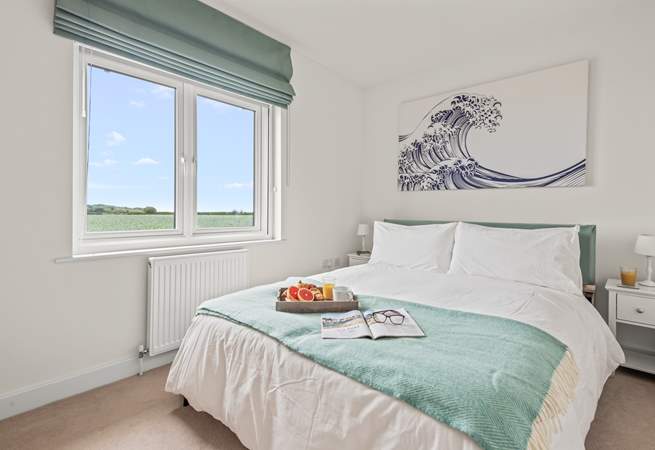 Pretty bedroom 4 is home to a comfy king-size double bed.