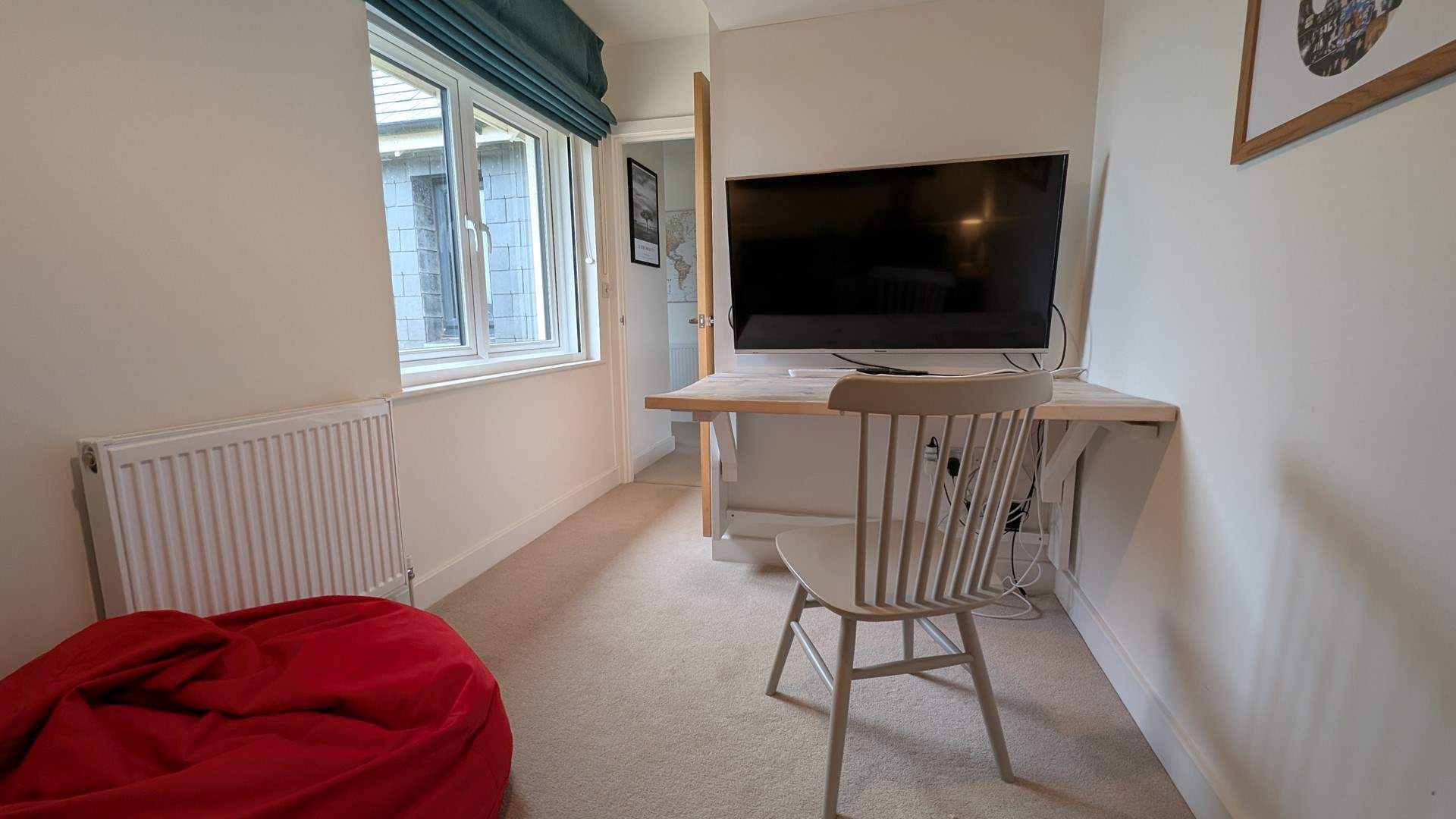 Another view of the flexible study/snug. The desk can be folded down to allow more room if needed.