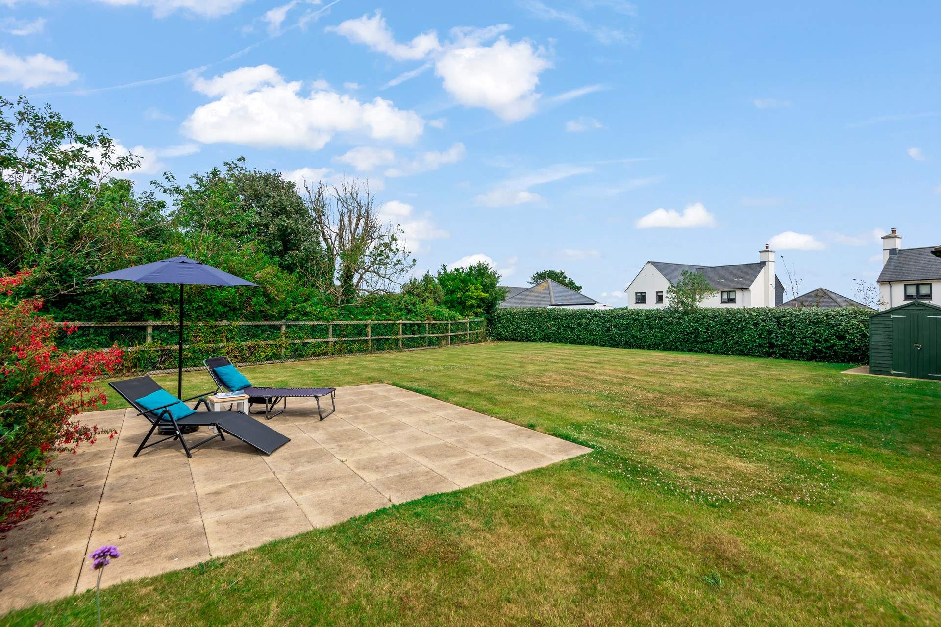 The large garden offers lots of different spaces to relax in.