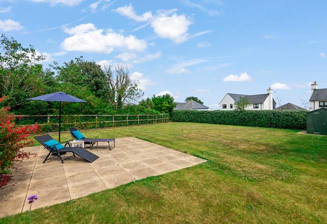 The large garden offers lots of different spaces to relax in.