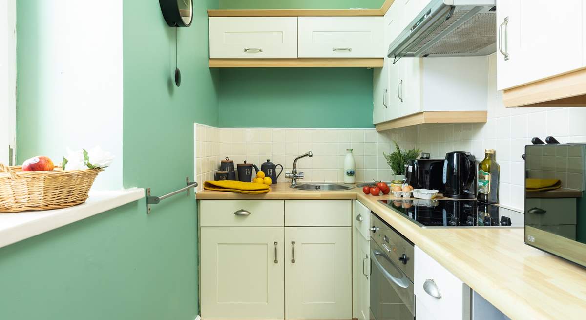 The separate kitchen is small but perfectly formed.