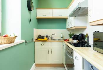The separate kitchen is small but perfectly formed.