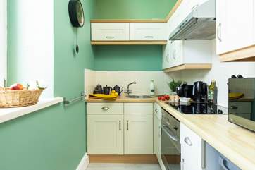 The separate kitchen is small but perfectly formed.