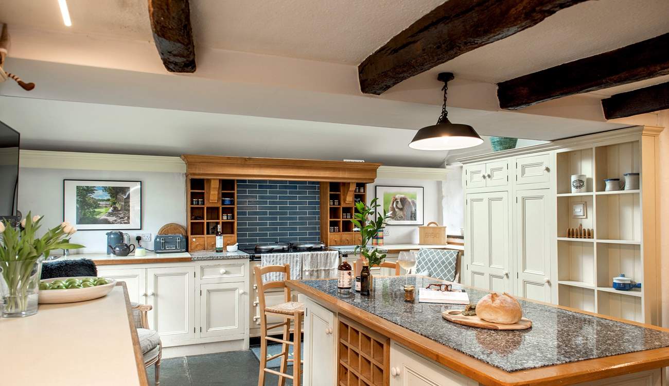 Perch on a stool and chat with the chef in the kitchen.