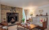 The characterful second sitting-room has an ornamental fireplace.  - Thumbnail Image