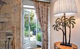 The patio doors lead to the terrace and beautiful gardens.  - Thumbnail Image