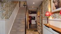 The staircase leads to the first floor bedrooms and family bathroom.