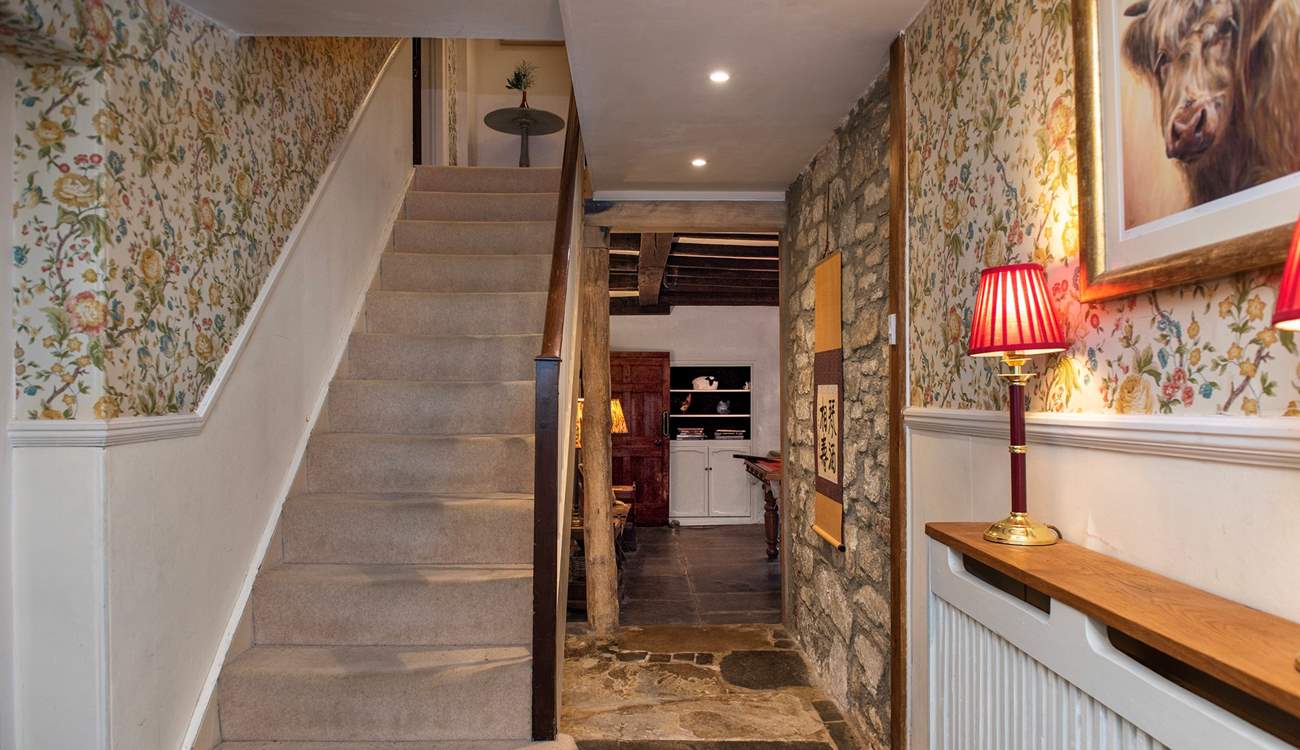 The staircase leads to the first floor bedrooms and family bathroom.