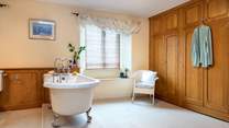 Relax in the fabulous free-standing bath after a busy day of exploring.